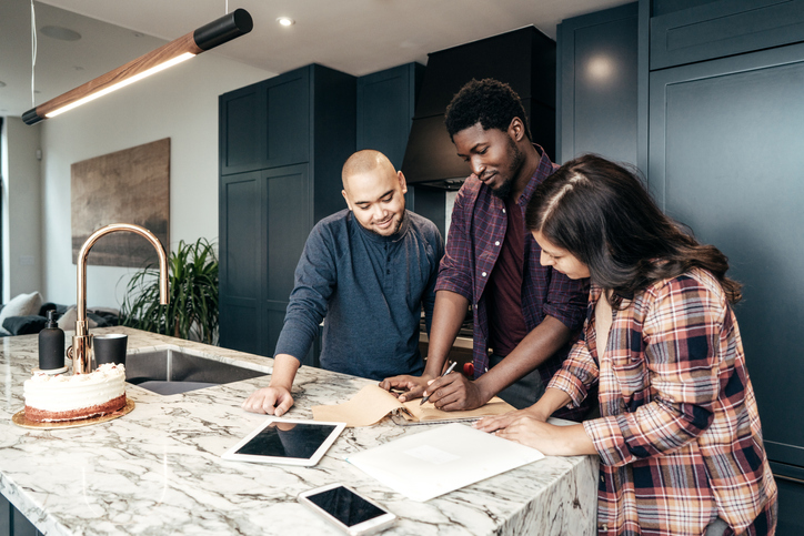 A general contractor gives some ideas to his new potential clients